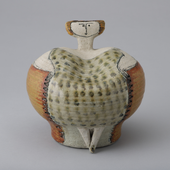 Woman Sitting in an Armchair