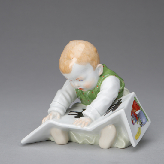 Sitting Child with Picture Book