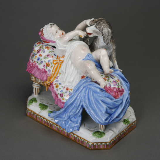 Baby in Bed with a Dog